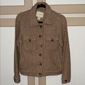 Brown bottoned jacket with pockets in perfect condition